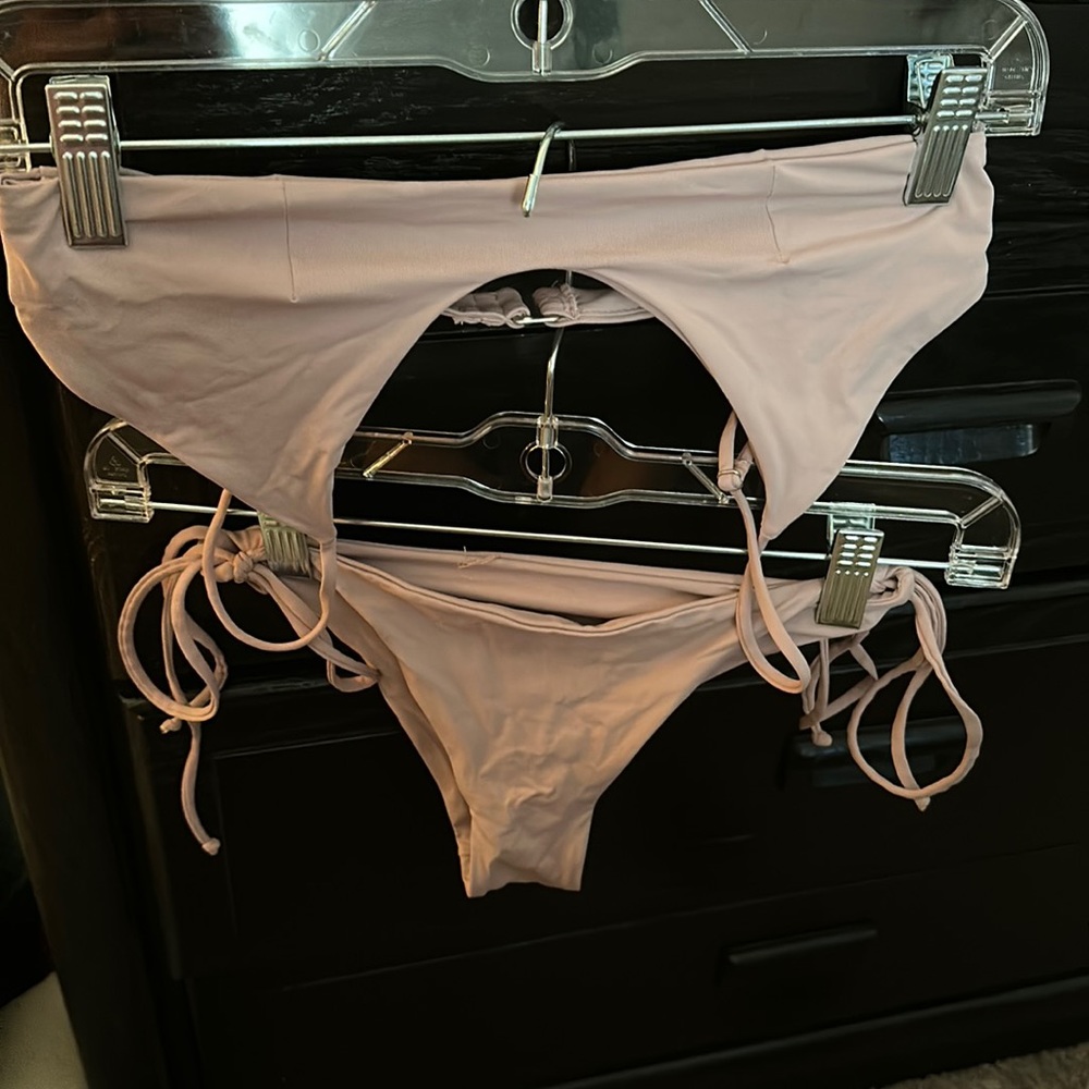 Tavik+ swim suit size medium top is like a small
